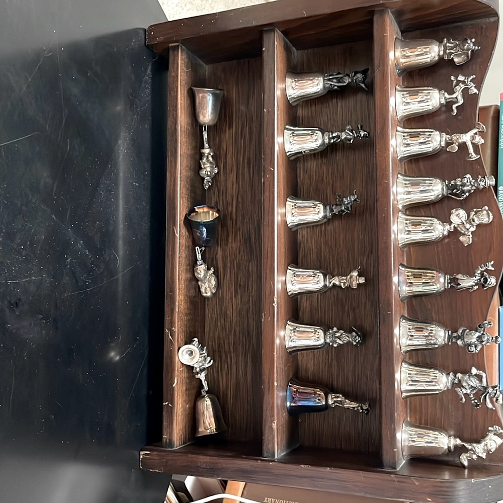 New England Disney Silver Plated Bells -set of 18 characters plus wood shelf